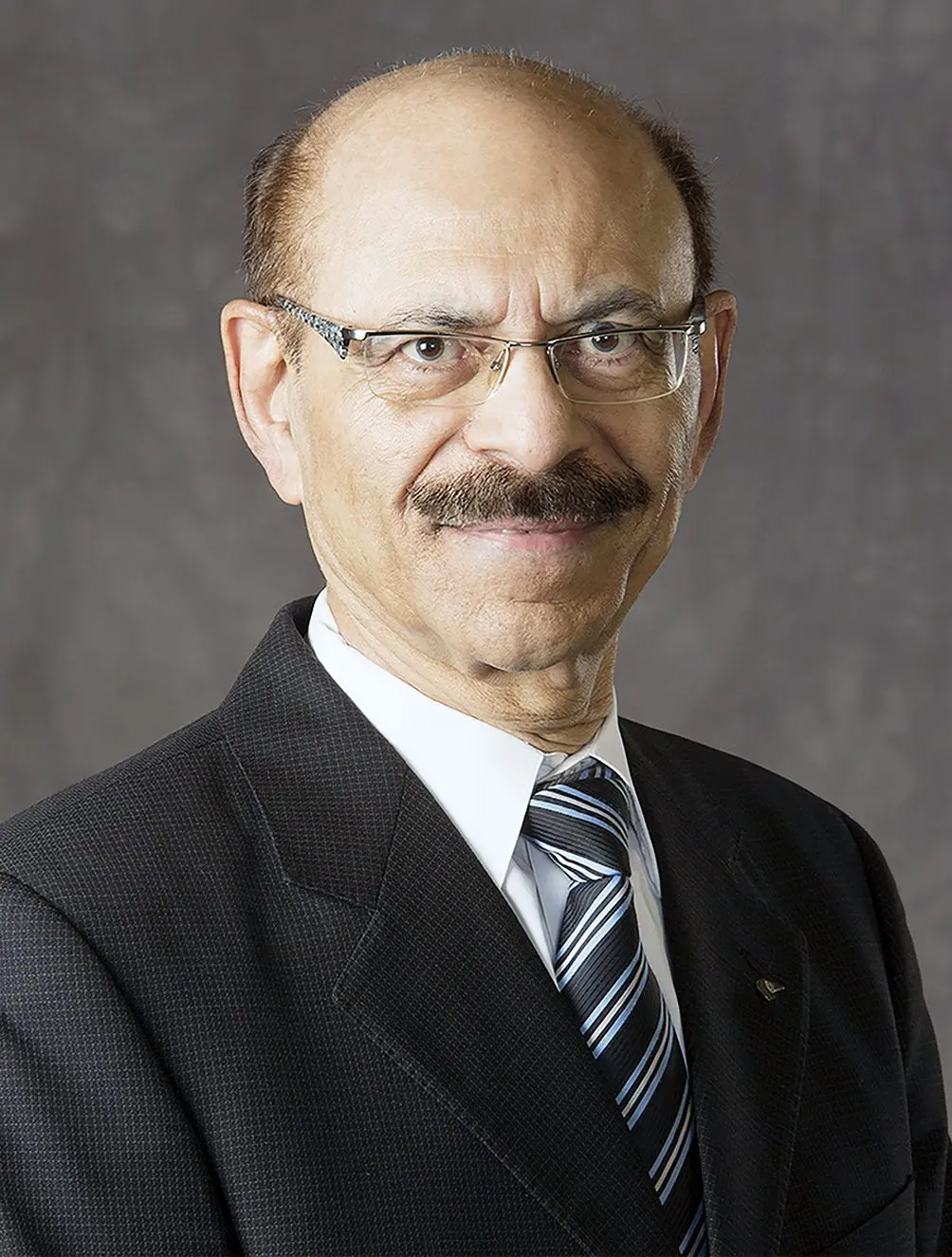 Dr. Amarjit Singh Arneja